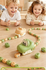 Two kids racing their Game Snakes on the living-room floor